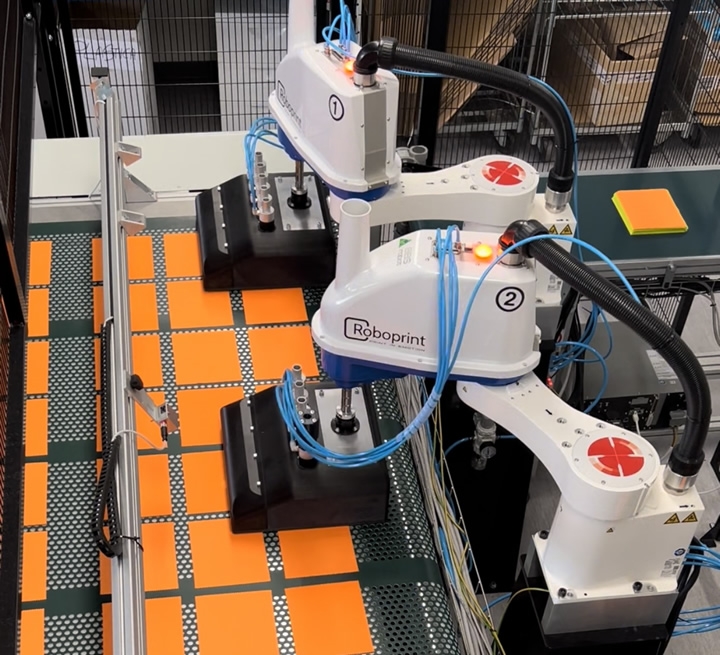 Giving lens cleaning cloths a robotic hand  - Robotic automation for textile processing 