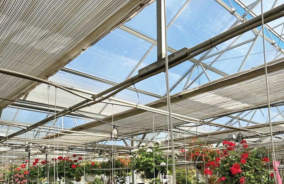 shade system used for cooling a greenhouse